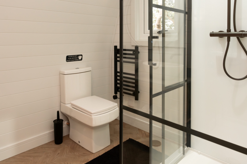Kinedo shower cubicles featured in NEC Glamping Pods 